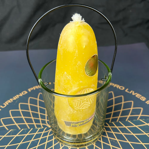 Bienenwachsstumpen im Glas